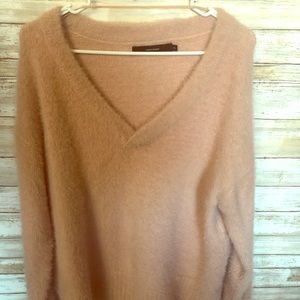 Pink fuzzy, soft sweater. V neck.